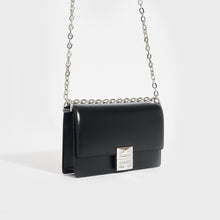 Load image into Gallery viewer, Side view of the GIVENCHY Small 4G Crossbody Bag in Black