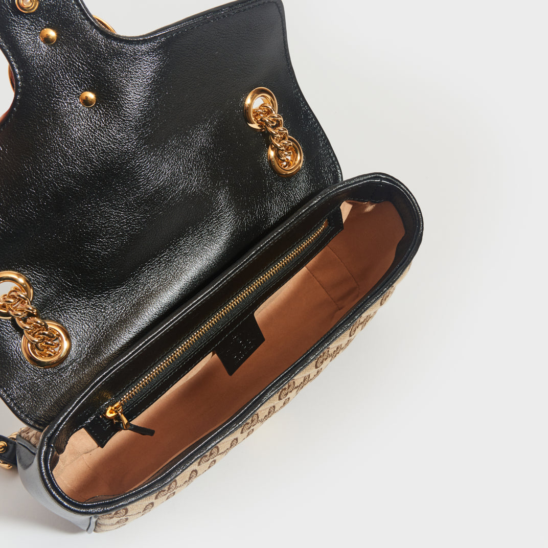 Inside view of the GUCCI GG Marmont Small Shoulder Bag in Original GG Canvas