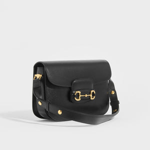 Side view of the GUCCI 1955 Horsebit Shoulder Bag in Black Leather