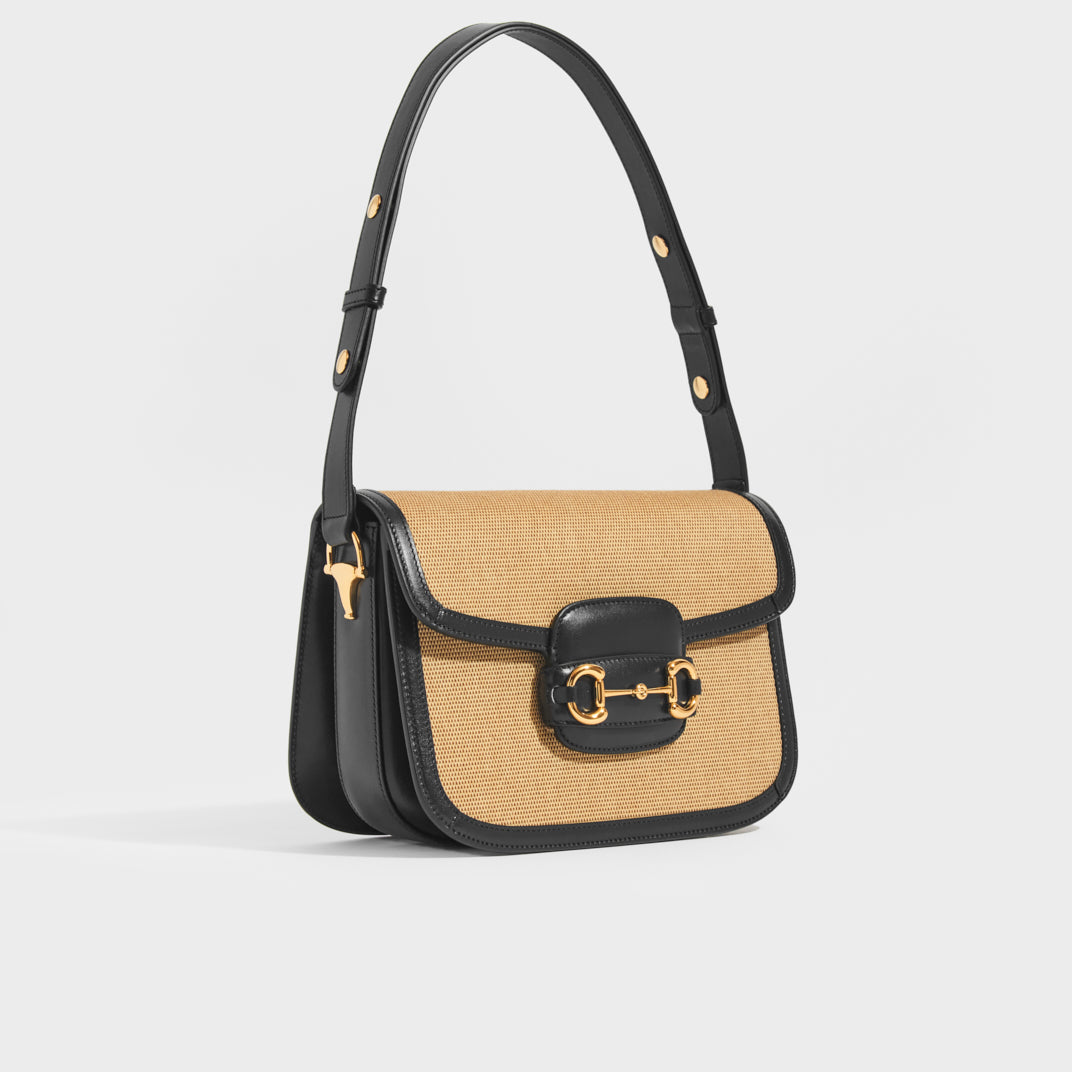 Side of the GUCCI 1955 Horsebit Shoulder Bag in Canvas with Navy Leather