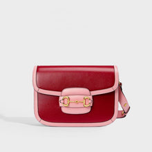 Load image into Gallery viewer, Front of the GUCCI 1955 horsebit shoulder bag in red and pink leather