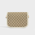 Rear view of the GUCCI 1955 Horsebit Shoulder Bag in Coated GG Canvas with White Leather