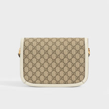 Load image into Gallery viewer, Rear view of the GUCCI 1955 Horsebit Shoulder Bag in Coated GG Canvas with White Leather