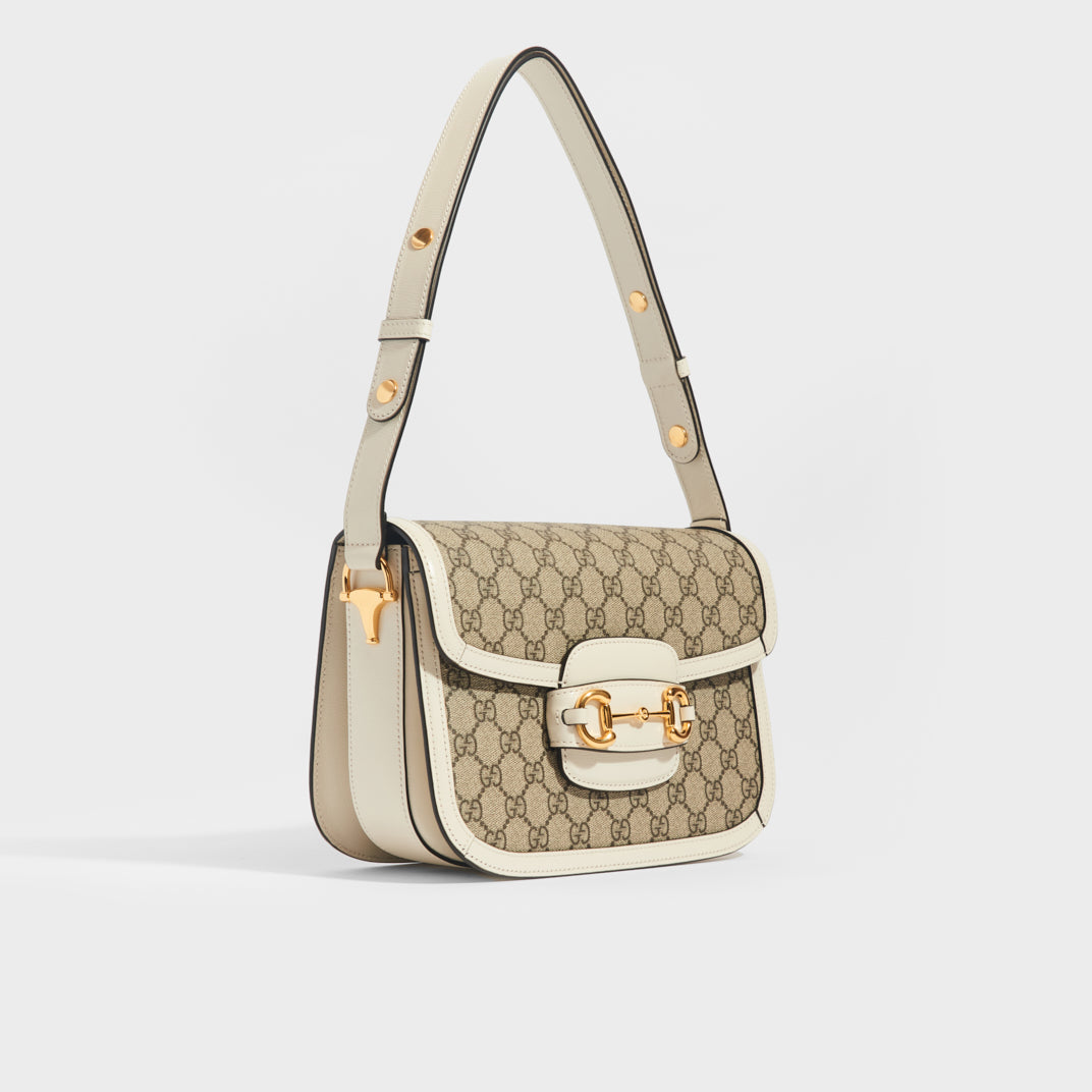 Sideview of the GUCCI 1955 Horsebit Shoulder Bag in Coated GG Canvas with White Leather