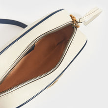 Load image into Gallery viewer, Inside view of Gucci GG Marmont Camera Bag in White Leather with Navy Trim