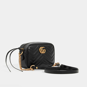 Side view of Gucci GG Marmont Mini Crossbody Bag in Black Matelasse Leather
