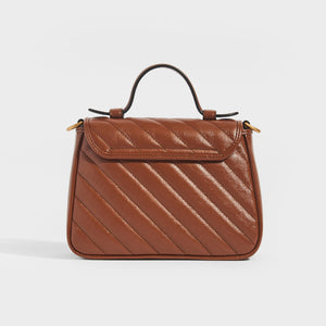 Back view of Gucci GG Marmont Mini Top Handle Bag in Brown Quilted Leather