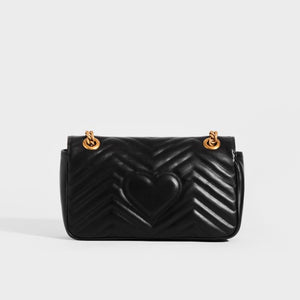 Back view of Gucci GG Marmont Small Shoulder Bag in Black Matelasse Leather with gold chain strap