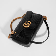 Load image into Gallery viewer, Top view of Gucci GG Marmont Small Shoulder Bag in Black Matelasse Leather with gold chain strap