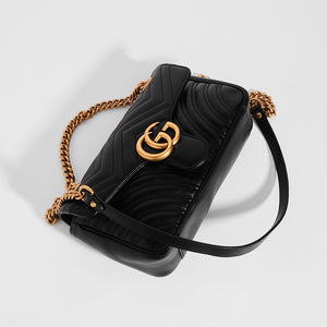 Top view of Gucci GG Marmont Small Shoulder Bag in Black Matelasse Leather with gold chain strap
