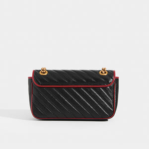 Back view of Gucci Marmont Small Shoulder Bag with Red Trim in Black Chevron Leather