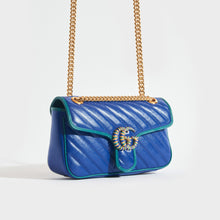 Load image into Gallery viewer, Side view of Gucci GG Marmont Small Shoulder Bag in Blue Leather with Turquoise trim and gold chain strap