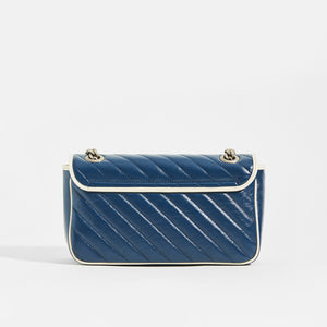 Back view of Gucci GG Marmont Small Shoulder Bag in Navy Matelasse Leather with White trim