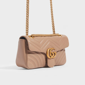 Side view of the GUCCI GG Marmont Small Shoulder Bag in Dusty Pink Leather