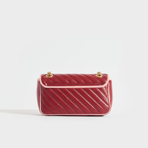 Back of the GUCCI GG Marmont Small Shoulder Bag in Red Leather with Pink Trim