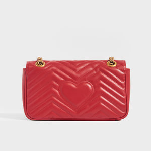Back view of GG Marmont Small Shoulder Bag in Red Leather with gold chain strap