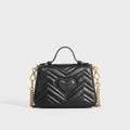 Rear view of the GUCCI GG Marmont Mini Top Handle Bag in Quilted Black Leather