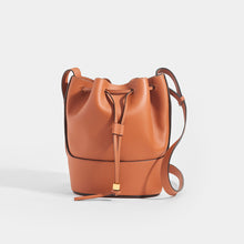 Load image into Gallery viewer, View of the LOEWE Balloon Small Bucket Bag in Tan Leather
