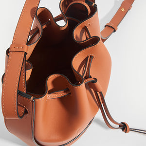 Inside of the LOEWE Balloon Small Bucket Bag in Tan Leather