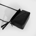 Mini Puzzle Bag in Black Leather