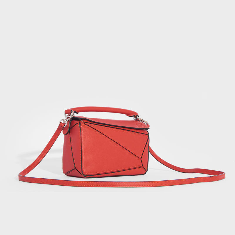 Side view of the LOEWE Puzzle Mini Leather Shoulder Bag in Pomelo