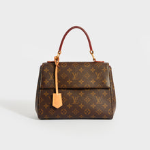 Load image into Gallery viewer, Front view of the LOUIS VUITTON Cluny BB Tote Bag in Monogram Canvas Bordeaux Fuchsia 2017