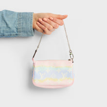 Load image into Gallery viewer, Model holding the LOUIS VUITTON Mini Pochette Accessories Escale in Pastel