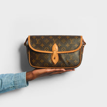 Load image into Gallery viewer, Model holding the LOUIS VUITTON Monogram Sologne Shoulder Bag 1992