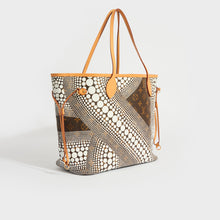 Load image into Gallery viewer, Side view of the LOUIS VUITTON x Yayoi Kusama Neverful MM Tote Bag 2012