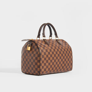 Side view of the LOUIS VUITTON Speedy 30 in Damier Ebène Canvas