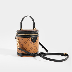Side view of LOUIS VUITTON Monogram Reverse Canvas Cannes Bag with strap