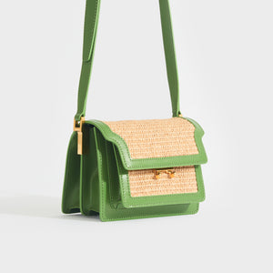 Side view of the MARNI Mini Raffia Trunk Crossbody Bag in Green showing the shoulder strap