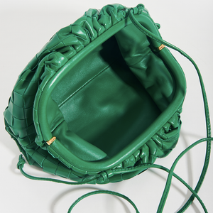 Interior photo of the BOTTEGA VENETA The Pouch 20 Intrecciato Crossbody in Green