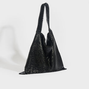 Side vie of the PACO RABANNE Pixel Mesh Moyen Shoulder Bag in Black