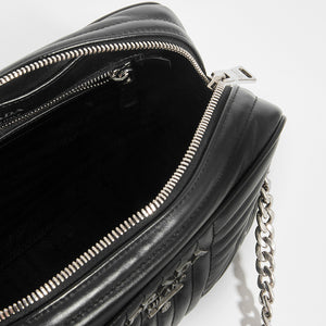 Inside view of Prada Diagramme shoulder bag in black leather and silver chain and hardware