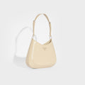 Side view of the PRADA Cleo Shoulder Bag in Desert Beige