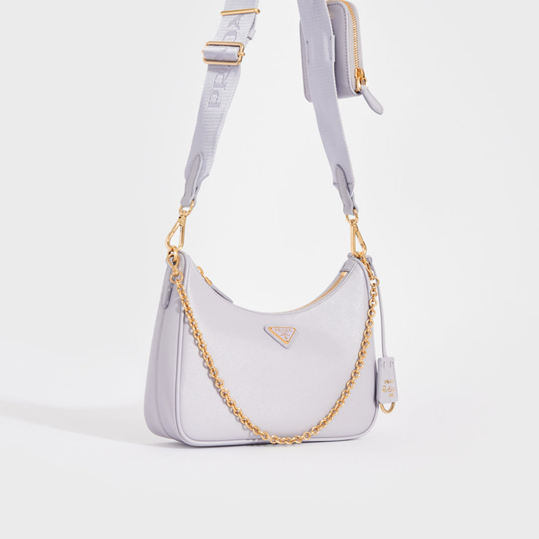 Side view of the PRADA Hobo Re-edition 2005 Saffiano Leather Crossbody in Wisteria