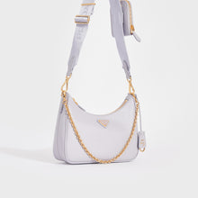Load image into Gallery viewer, Side view of the PRADA Hobo Re-edition 2005 Saffiano Leather Crossbody in Wisteria
