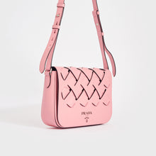 Load image into Gallery viewer, Side view of the PRADA Large Woven Motif Leather Shoulder Bag in Pink