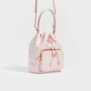 Side view of PRADA Nylon Top Handle Drawstring Bucket Bag Pink
