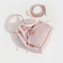 Load image into Gallery viewer, Flat shot of PRADA Nylon Top Handle Drawstring Bucket Bag Pink