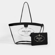 Load image into Gallery viewer, Back view of PRADA PVC Clear Logo-Print Tote in Clear/Black and detachable logo printed pouch