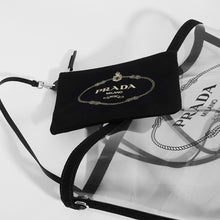 Load image into Gallery viewer, Flat shot and close up of PRADA PVC Clear Logo-Print Tote in Clear/Black and detachable pouch