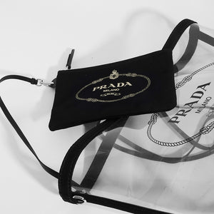 Flat shot and close up of PRADA PVC Clear Logo-Print Tote in Clear/Black and detachable pouch