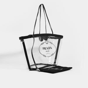 Side view of PRADA PVC Clear Logo-Print Tote in Clear/Black and detachable pouch