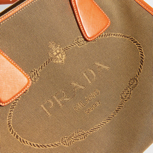Close up detail of the PRADA Vintage Galleria Saffiano Bag in Beige Canvas Leather