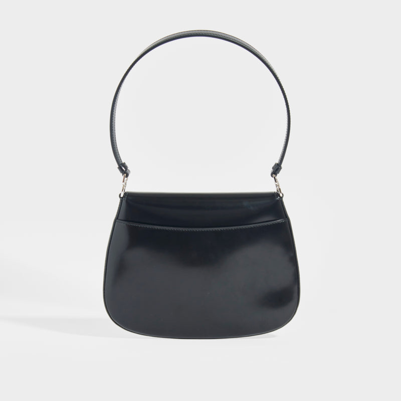 Rear view of the PRADA Cleo Brushed Leather Shoulder Bag With Flap in Black