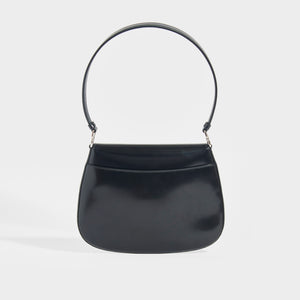 Rear view of the PRADA Cleo Brushed Leather Shoulder Bag With Flap in Black