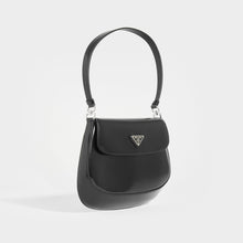Load image into Gallery viewer, Side view of the Products PRADA Cleo Brushed Leather Shoulder Bag With Flap in Black