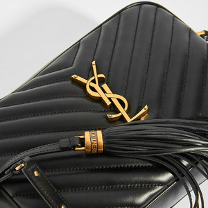 Gold Hardware & Leather Tassel Detail on SAINT LAURENT Lou Camera Bag in Black Matelassé Leather 